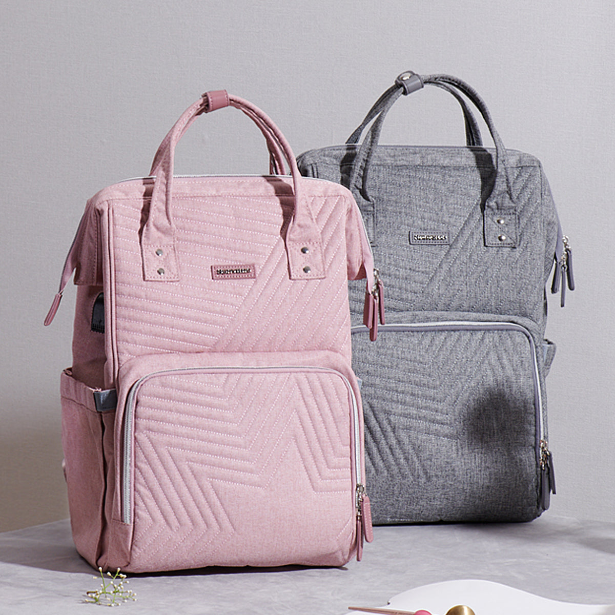 Mochila pañalera acolchada con 13 bolsillos